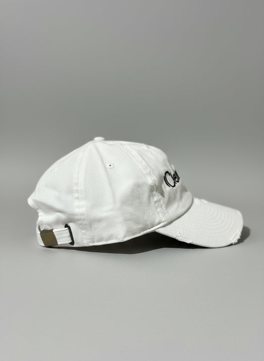 White cap with "Clean Heart" embroidered in black
