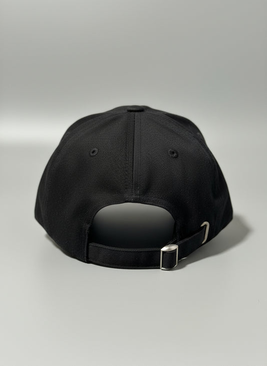 Black cap with metal clasp 