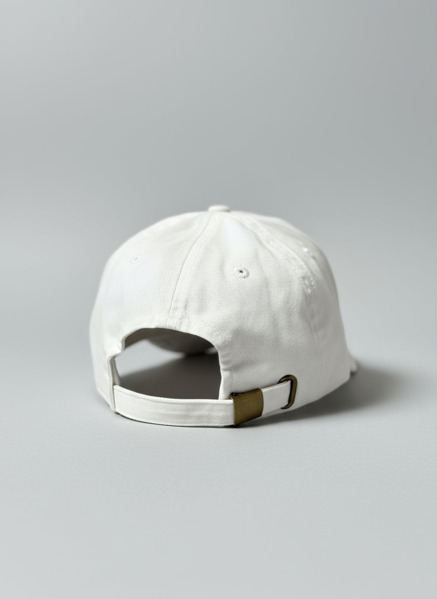 White cap with a gold clasp