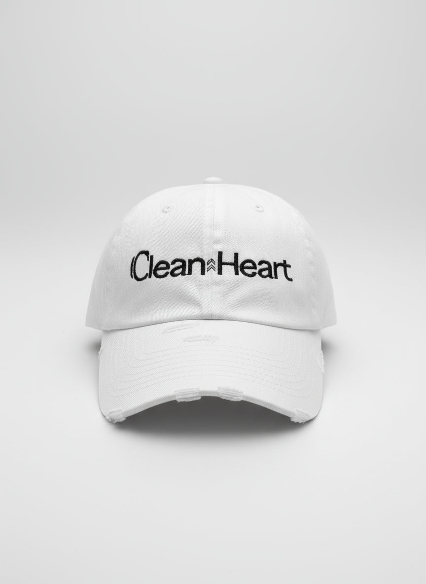 White cap with "Clean Heart" embroidered in black 