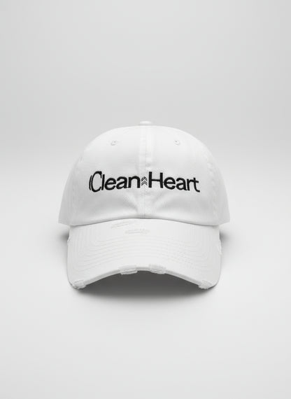 White cap with "Clean Heart" embroidered in black 