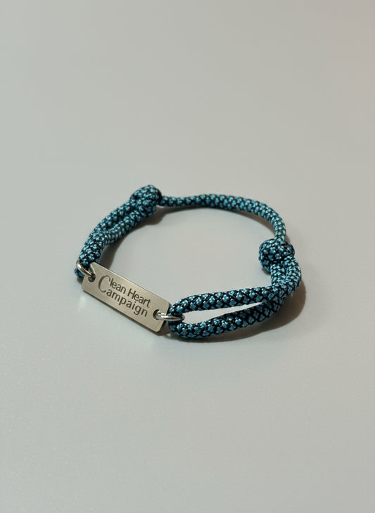 Bracelet with textured band and engraved tag "Clean Heart Campaign"