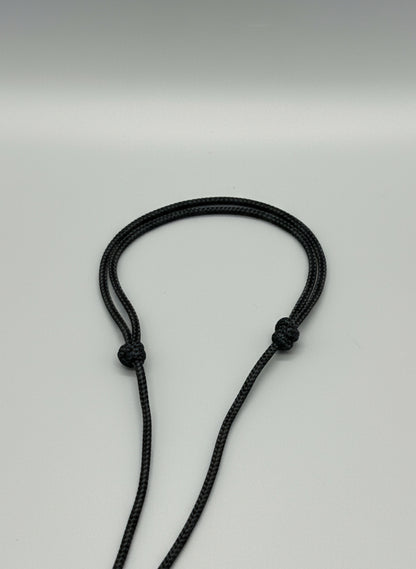 Black cord necklace with knotted adjustment closure