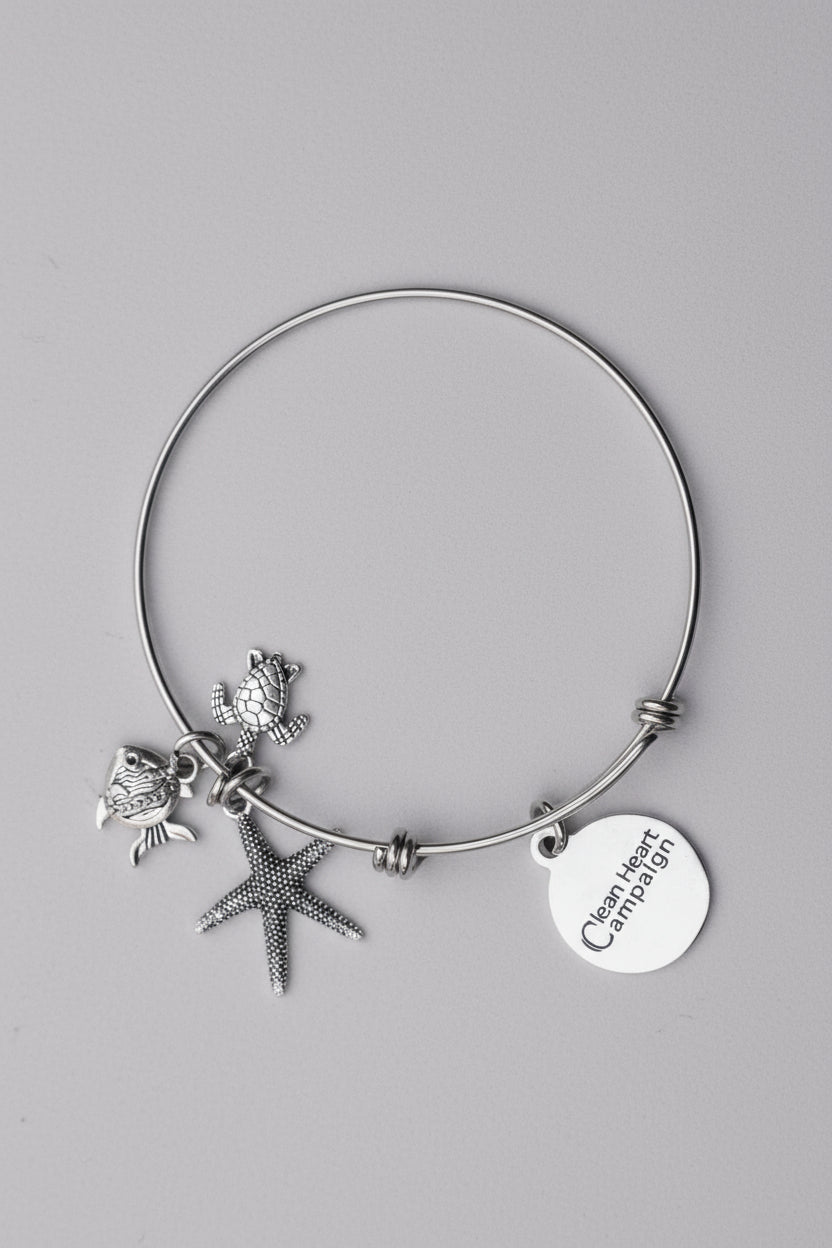 Silver bracelet with starfish and fish charms 