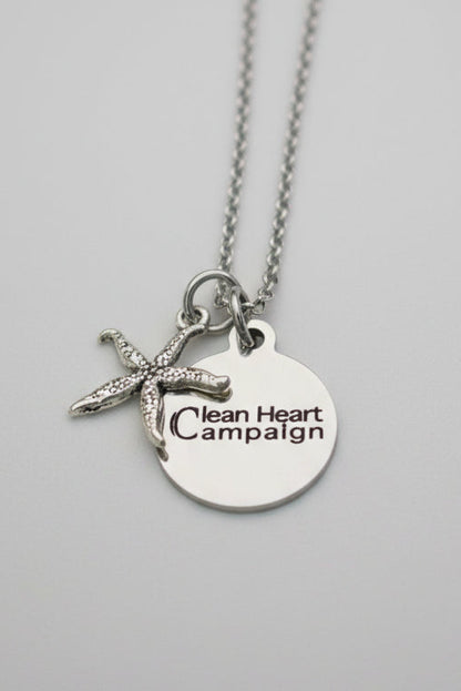 Pendant necklace with starfish charm and "Clean Heart Campaign" engraved on a circle charm