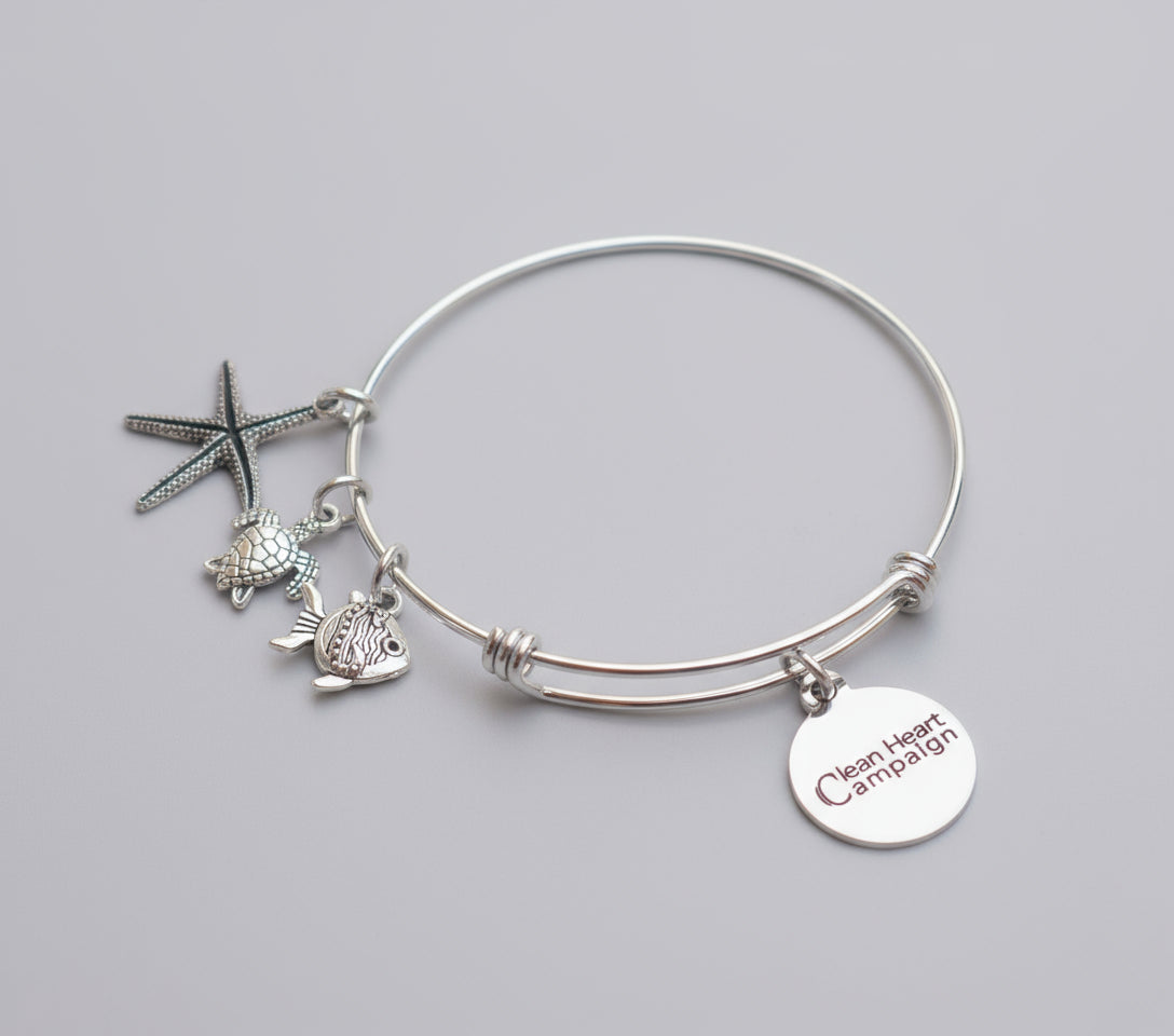 Silver bracelet with turtle and starfish charms 
