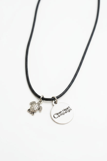 Necklace with turtle charm and 'Clean Heart Campaign' tag 
