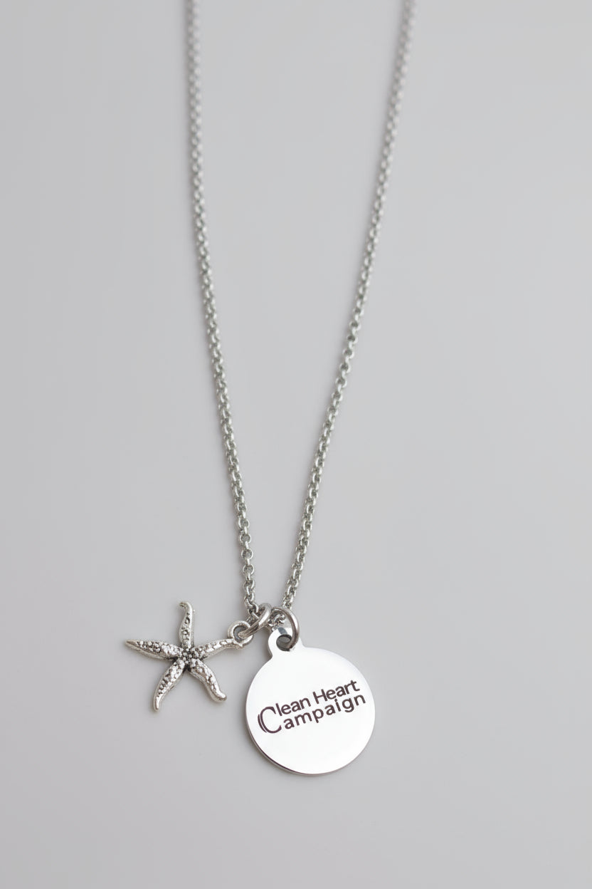 Necklace with starfish charm and 'Clean Heart Campaign' engraved in a circle charm