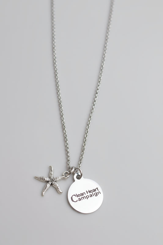 Necklace with starfish charm and 'Clean Heart Campaign' engraved in a circle charm